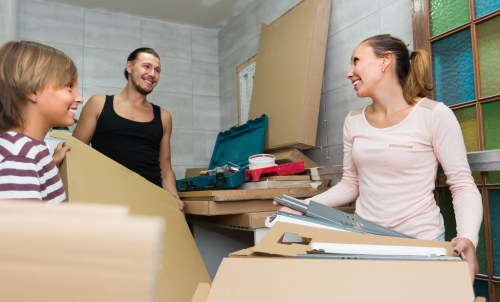 Pimlico Movers team sorting recyclable packing materials during a sustainable house move