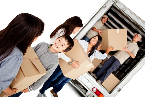 Packing and loading household belongings for a quick move in a Pimlico flat