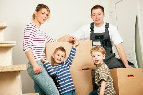 Student removals team helping with boxes in Pimlico street setting