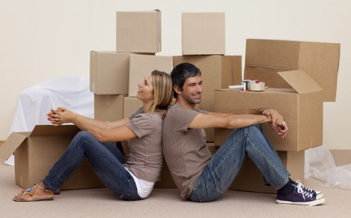 Professional Pimlico removal team preparing furniture for transport