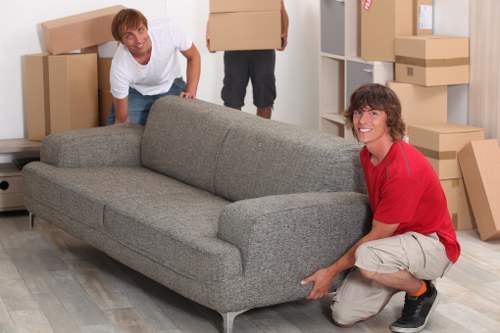 Furniture and moving supplies prepared for a Pimlico home relocation