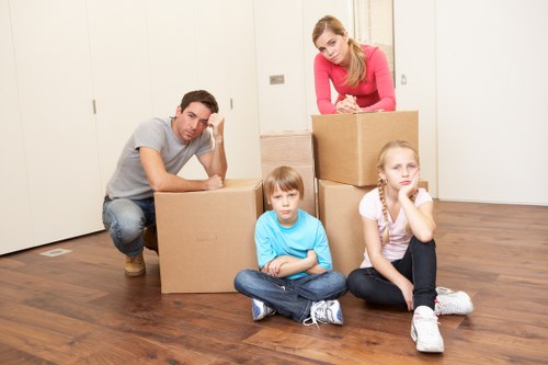 Pimlico movers assisting with an office relocation in a busy area